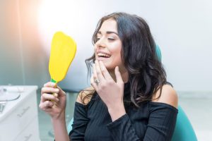 Woman checking her smile